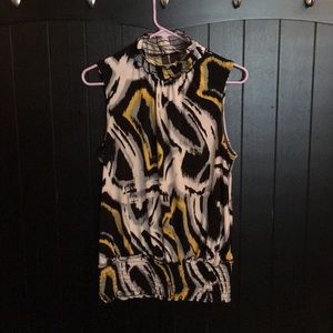 High neck dressy sleeveless blouse.